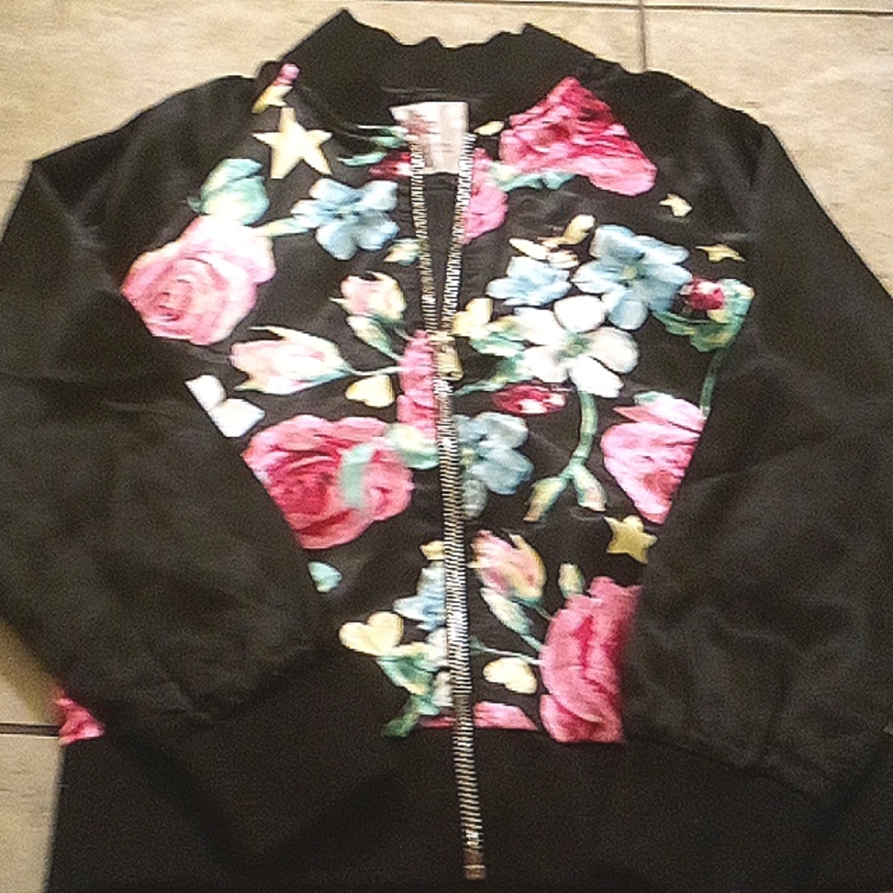 Justice girls jacket, black with pink, blue and white flowers, size 8-10